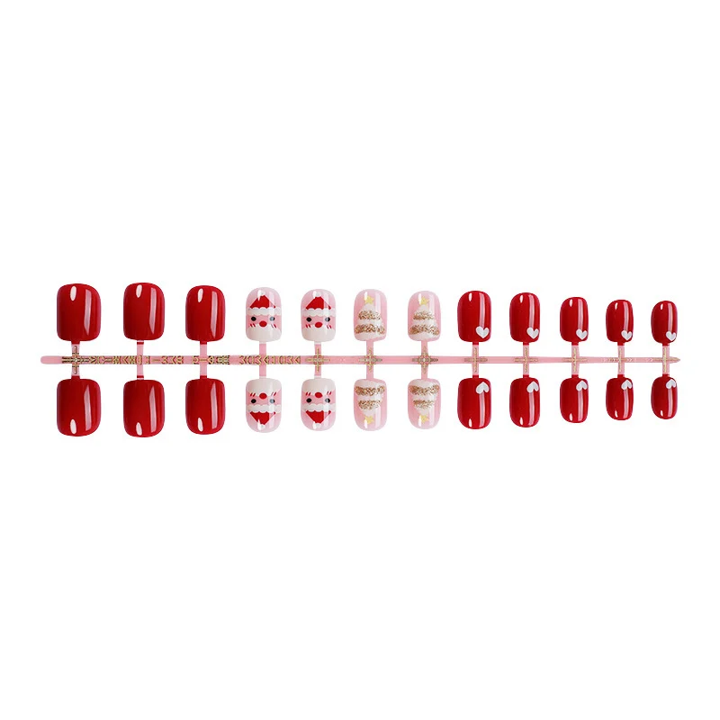 Kunstnagelset mit festlichen Weihnachtsmotiven und Glitzerakzenten Brehn