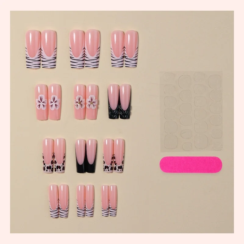 Kunstnagelset mit floralen und marmorierten Designs Brehn