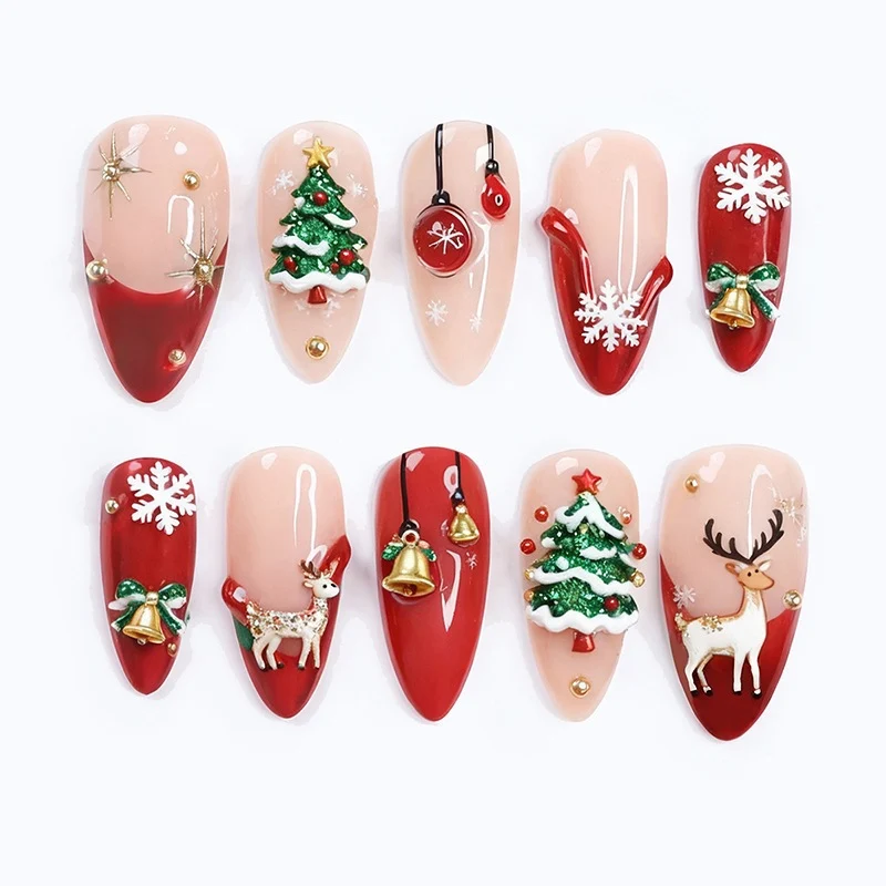 Kunstnagelset mit festlichen Motiven und Glitzerelementen Brehn