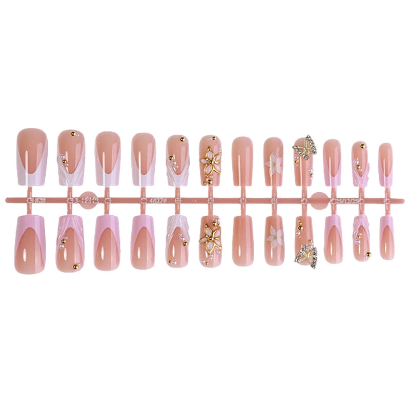 Kunstnagelset mit exklusiven Blüten- und Glitzerelementen Brehn