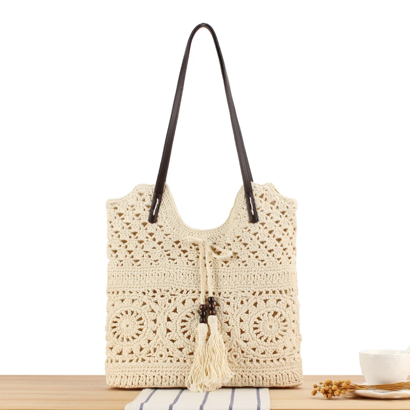 Kreative Makramee-Handtasche mit Fransen-Details Skanto