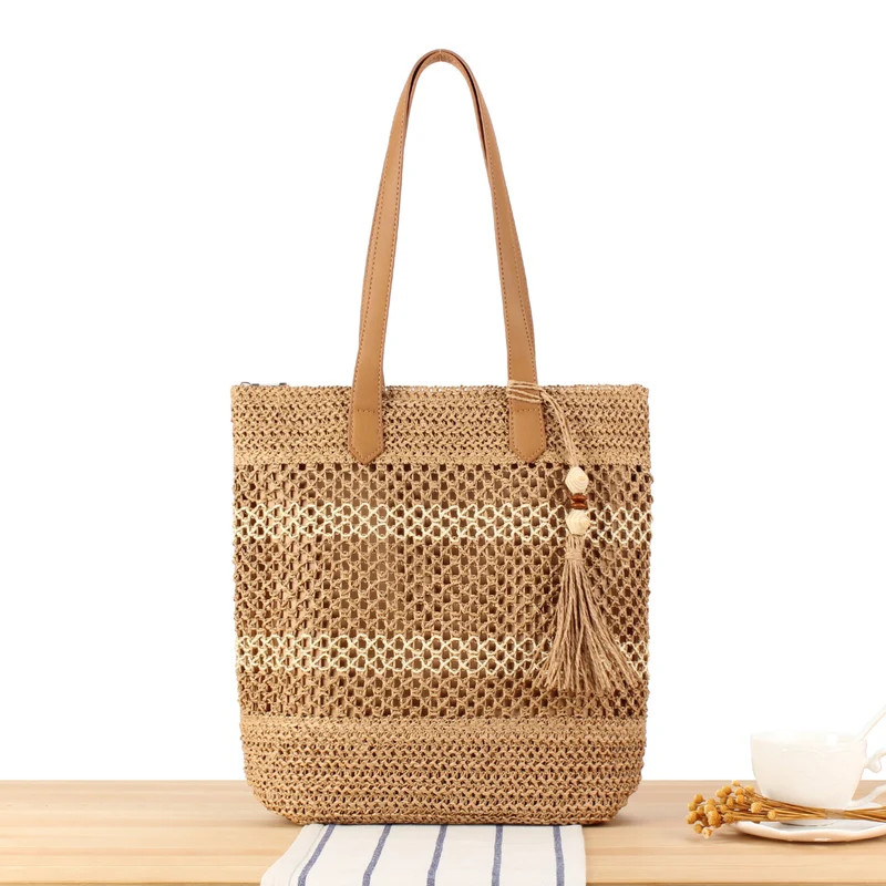 Handtasche aus handgewebtem Naturmaterial mit eleganten Quastendetails Skanto