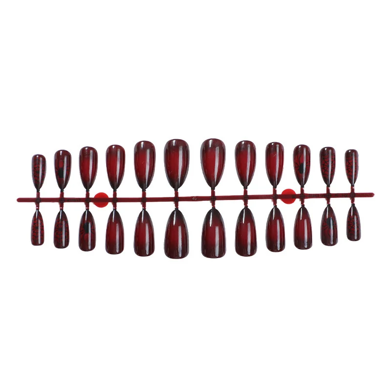 Kunstnagelset mit eleganten und tiefroten Nuancen Brehn