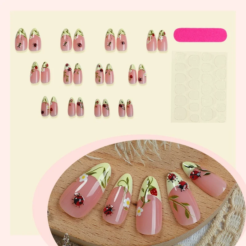 Kunstnagelset mit floralen Motiven und glänzenden Akzenten Brehn