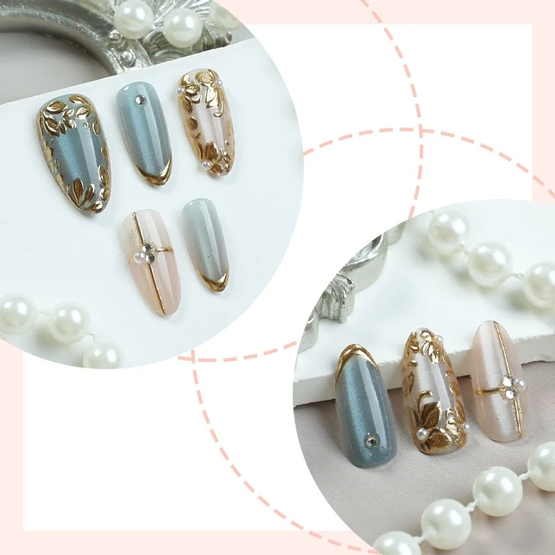 Kunstnagelset mit floralen Goldakzenten und eleganten Designs Brehn