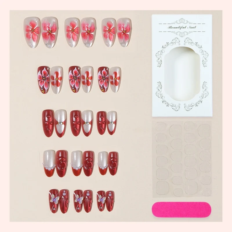 Kunstnagelset mit floralen Designs und Glitzerelementen Brehn