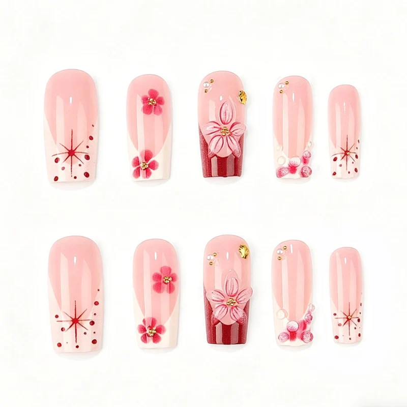 Kunstnagelset mit floralen 3D-Details und Glitzerakzenten Brehn
