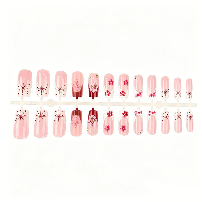 Kunstnagelset mit floralen 3D-Details und Glitzerakzenten Brehn