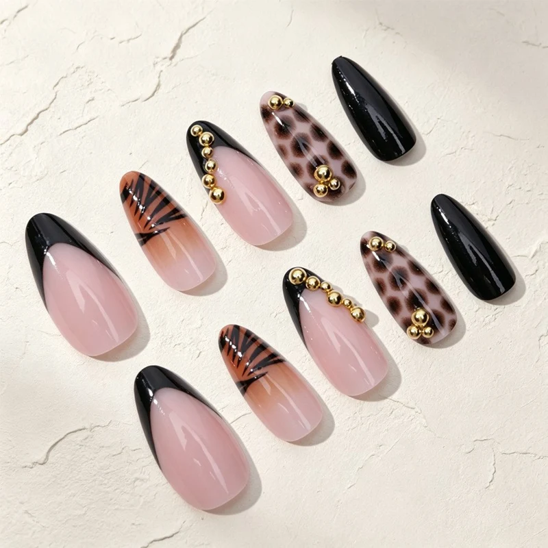 Kunstnagelset mit eleganten Tier- und Glitzermustern Brehn