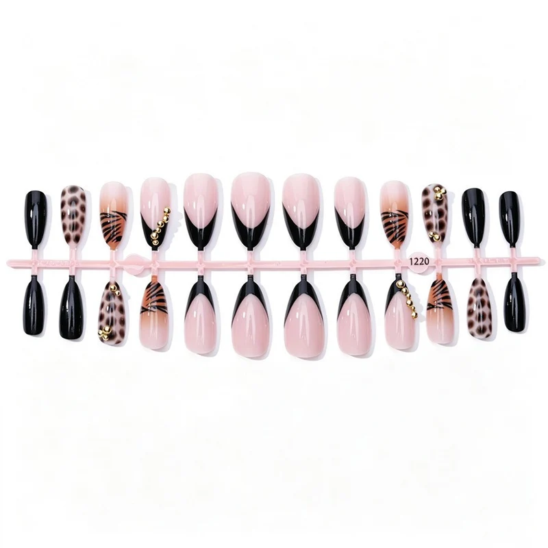 Kunstnagelset mit eleganten Tier- und Glitzermustern Brehn