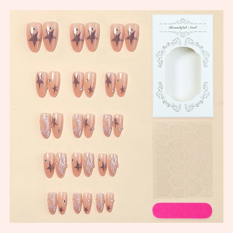 Kunstnagelset mit eleganten Stern- und Glitzerdetails Brehn