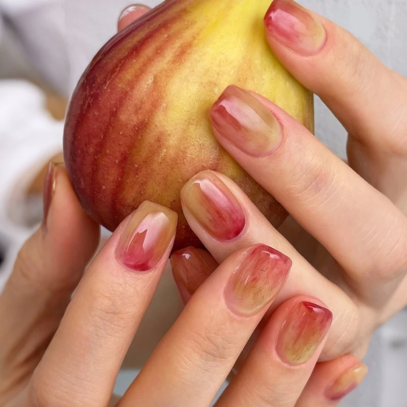 Kunstnagelset mit eleganten Farbverläufen und kreativen Akzenten Brehn