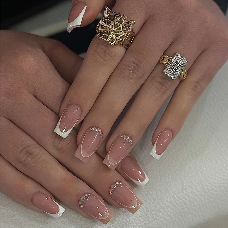 Kunstnagelset mit eleganten Farbverläufen und Glitzerdetails Brehn