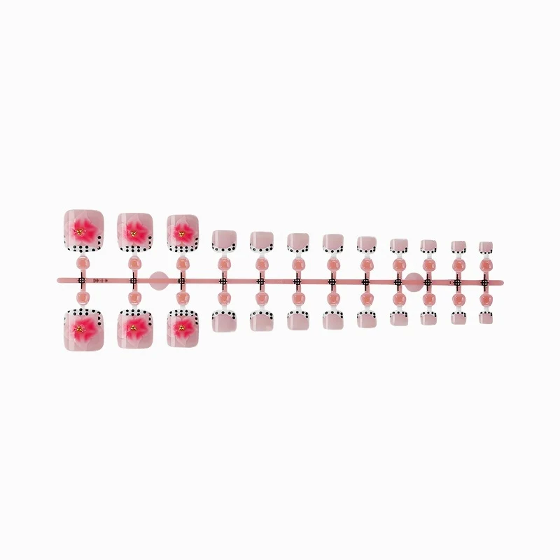 Kunstnagelset mit eleganten Blüten- und Punkte-Design Brehn