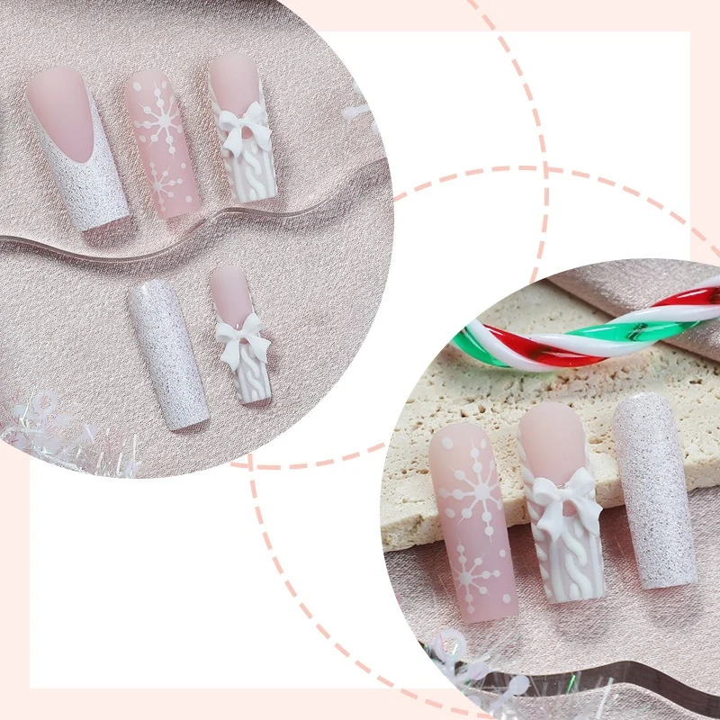 Kunstnagelset mit eleganten Blüten- und Glitzerverzierungen Brehn