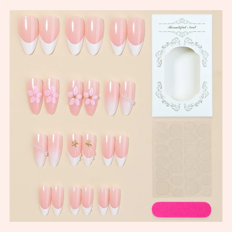 Kunstnagelset mit eleganten Blüten- und Glitzerakzenten Brehn