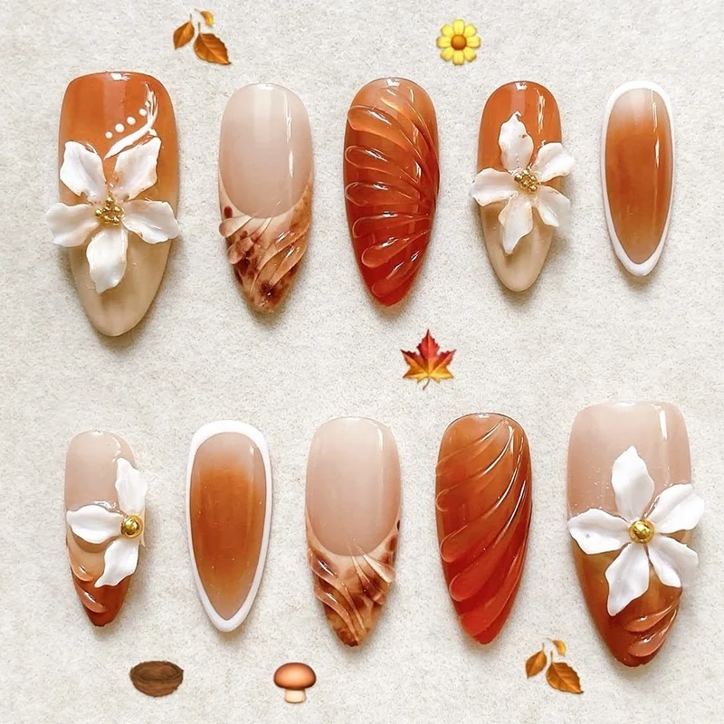 Kunstnagelset mit eleganten Blumen- und Herbstmotiven Brehn