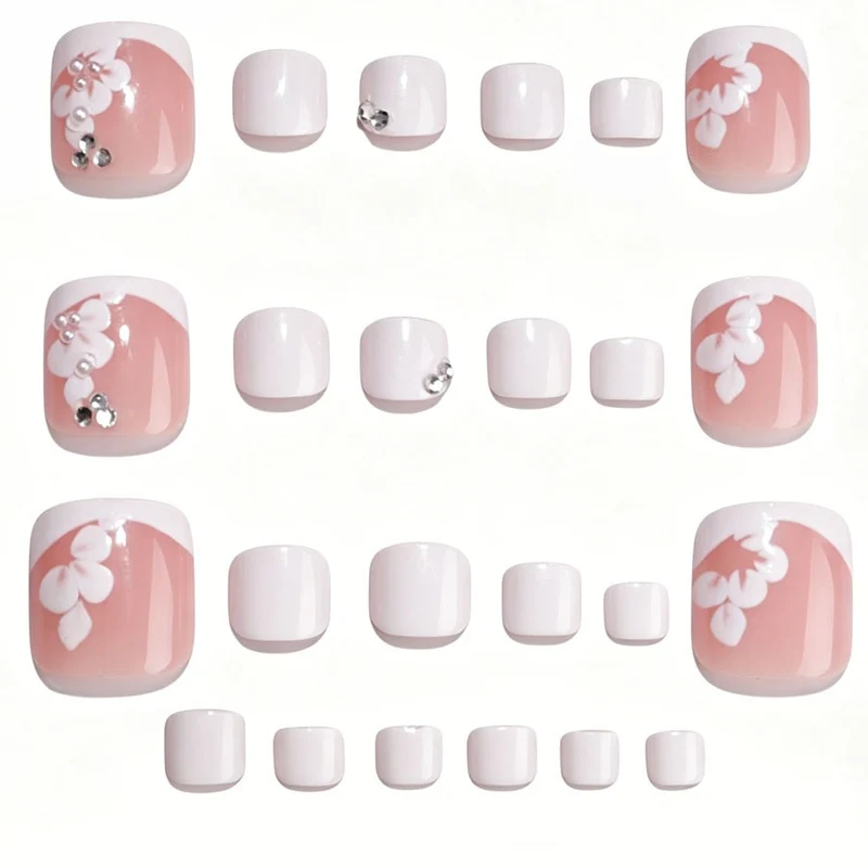 Kunstnagelset mit eleganten Blumen-Design und Glitzerakzenten Brehn