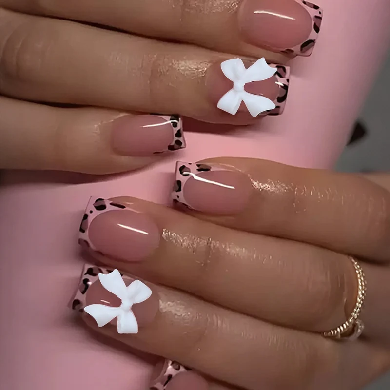 Kunstnagelset mit bunten Schleifen- und Leopardenmotiven Brehn