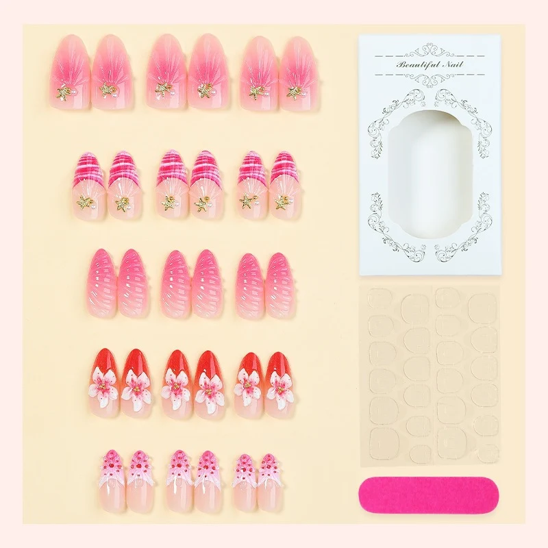 Kunstnagelset mit blühenden 3D-Details und Glitzerakzenten Brehn