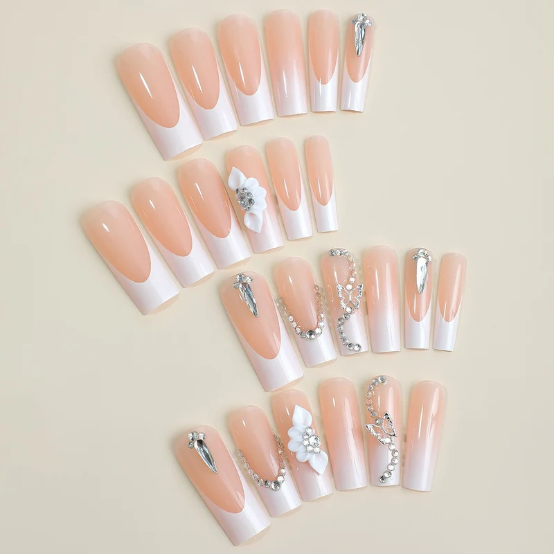 Kunstnagelset mit eleganten 3D-Akzenten und Glitzerverzierungen Brehn