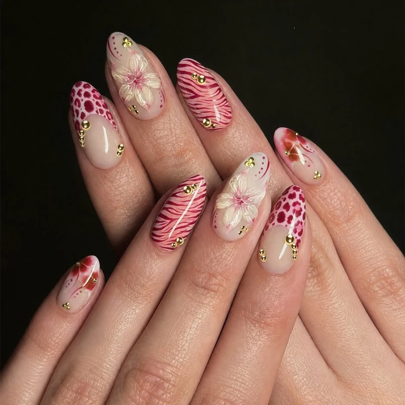 Kunstnagel Set mit floralen Designs und Glitzerelementen Brehn
