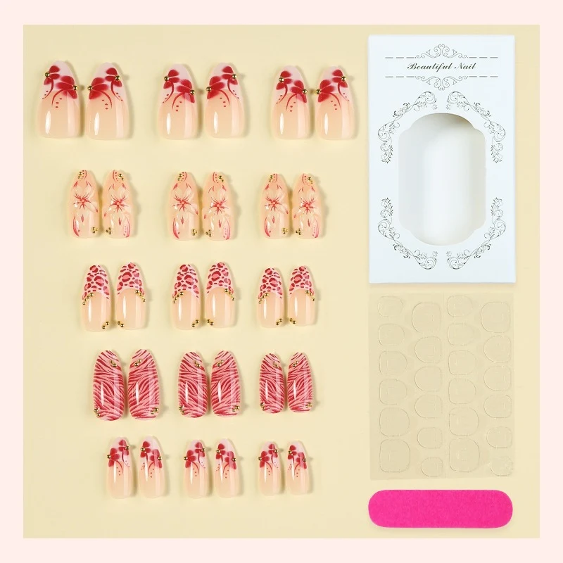 Kunstnagel Set mit floralen Designs und Glitzerelementen Brehn