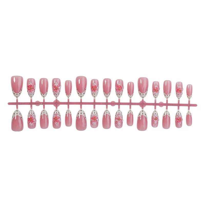 Kunstnagel-Set mit floralen Designs und Glitzerakzenten Brehn