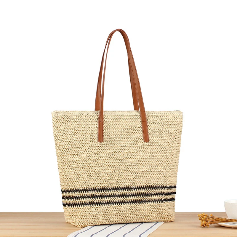 Geflochtene Strandtasche mit Ledergriff Skanto