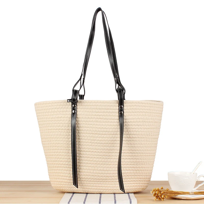 Geflochtene Strandtasche mit eleganten Kunstledergriffen Skanto