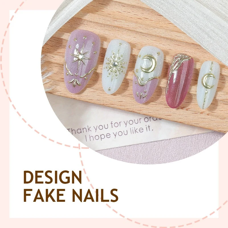 Kunstnagelset mit glamourösen Glitter- und Sternakzenten Brehn