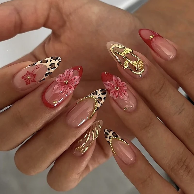 Kunstnagelset mit glamourösen Blüten- und Glitzerelementen Brehn