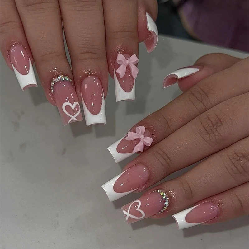 Kunstnagelset mit glamourösem Leopardenmuster und eleganten Schleifen Brehn