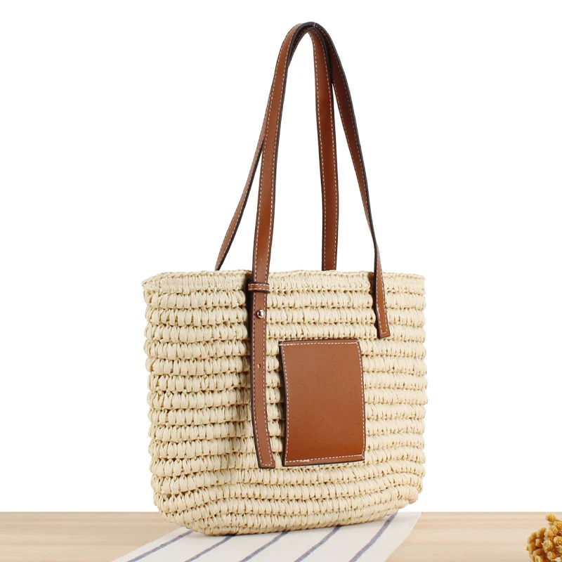 Geflochtene Handtasche mit eleganter Lederapplikation Skanto