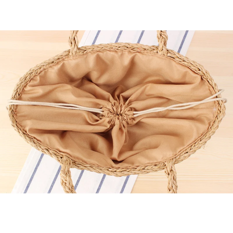 Geflochtene Tragetasche aus Natur-Raffia mit robusten Trageriemen Skanto
