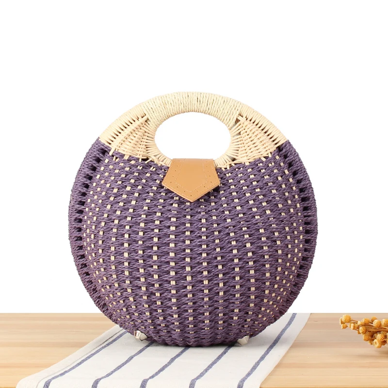 Runde Strohtasche mit elegantem Ledergriff Skanto