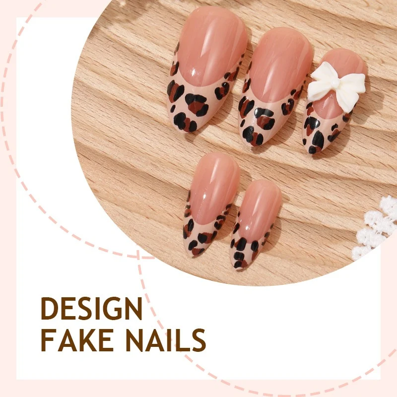 Künstliches Nagelset mit elegantem Leoparden-Design und verspielten Bogenakzenten Brehn