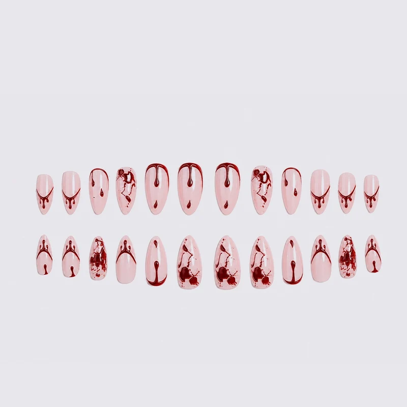 Künstliches Nagelset mit Blutakzenten und kreativen Designs Brehn