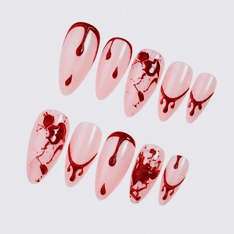 Künstliches Nagelset mit Blutakzenten und kreativen Designs Brehn