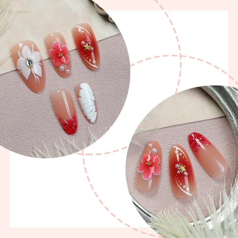Künstliches Kunstnagelset mit floralem Design und glamourösen Akzenten Brehn