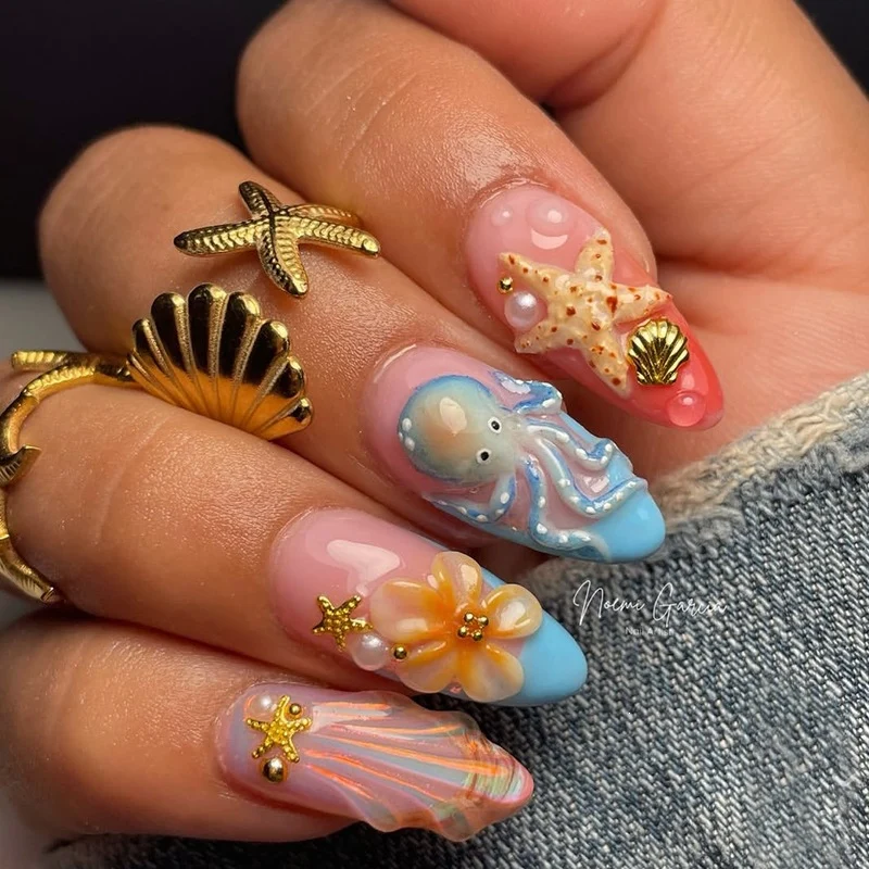 Kreatives Kunstnagelset mit maritimen Designs und eleganten Verzierungen Brehn