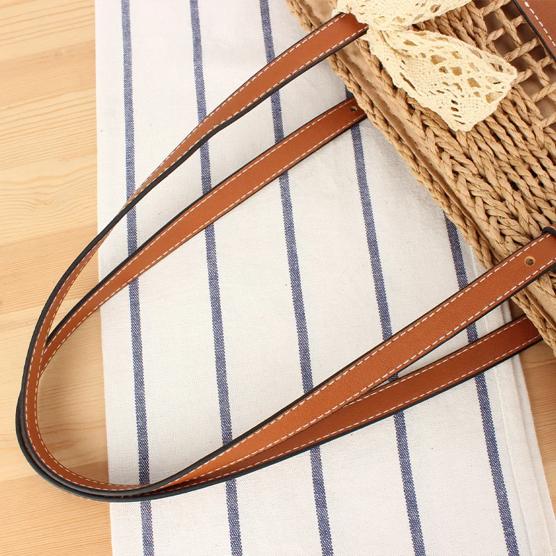 Eleganter gewebter Raffia-Korb mit Canvas-Akzent Skanto