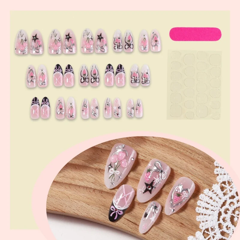 Künstliche Nagel-Kollektion mit verspielten Schleifen- und Glitzerdetails Brehn