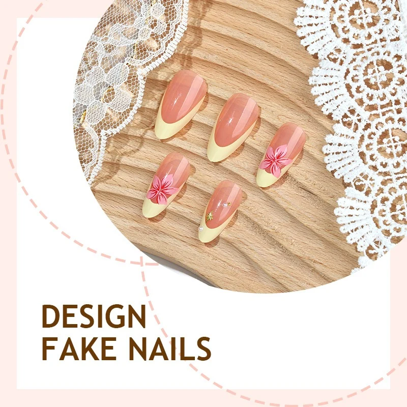 Künstliche Nagel-Kollektion mit floralen Akzenten und eleganten Verzierungen Brehn