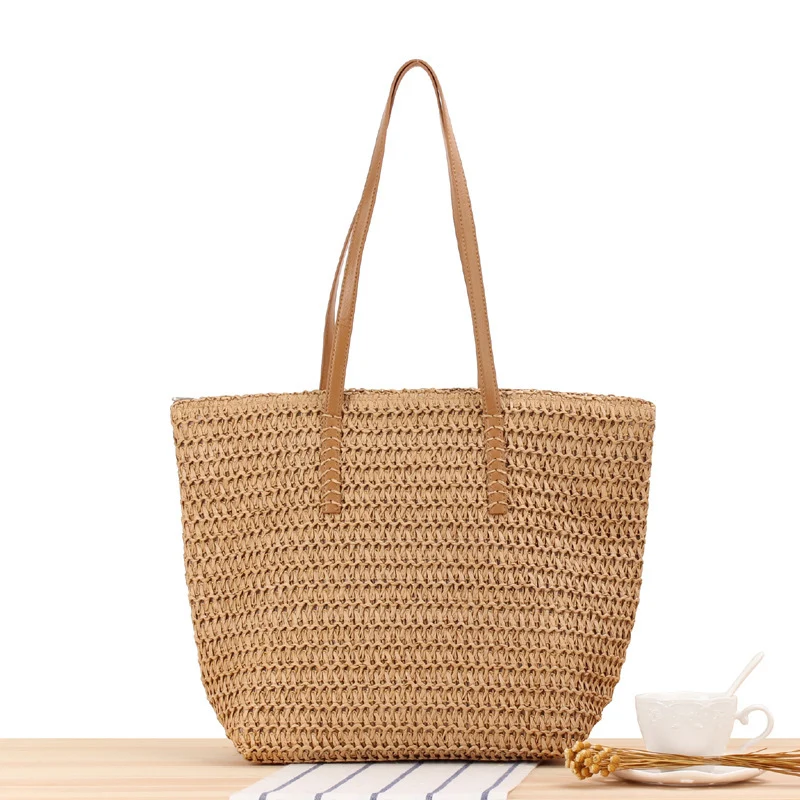 Elegante Stroh-Handtasche mit robusten Ledergriffen Skanto
