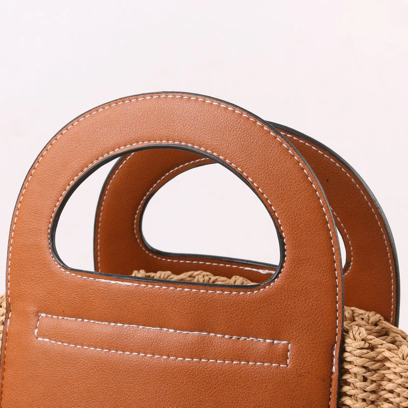 Handtasche aus hochwertigem Bast mit edlen Lederakzenten Skanto