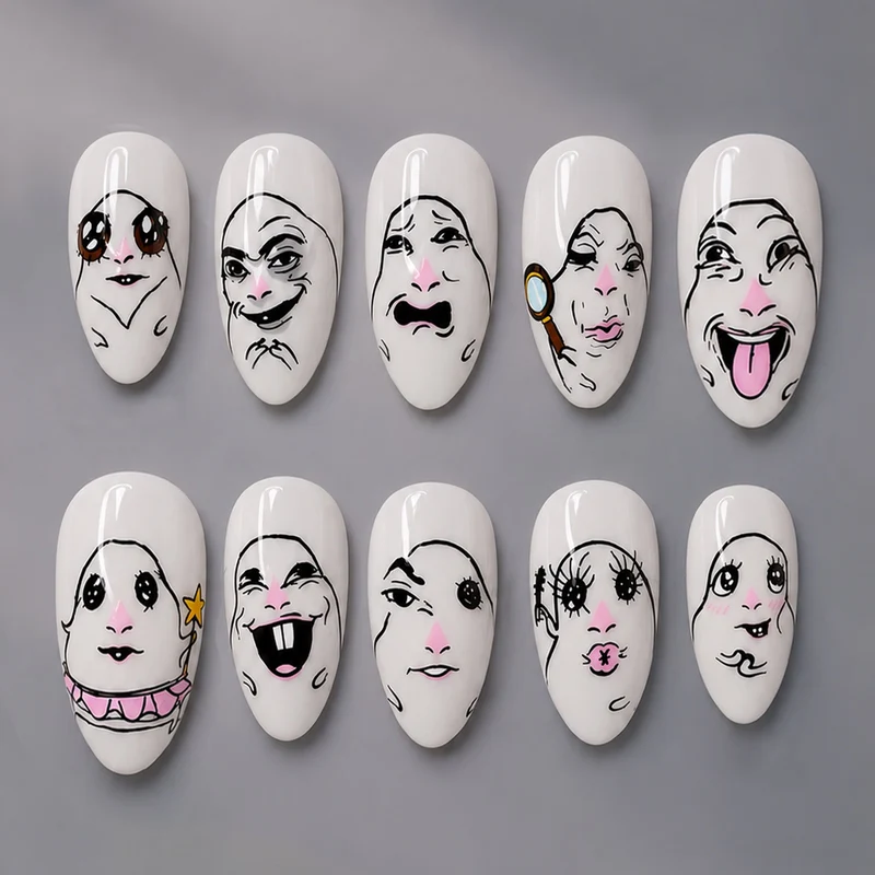 Kreatives Kunstnagelset mit Gesichtsmotiven Brehn