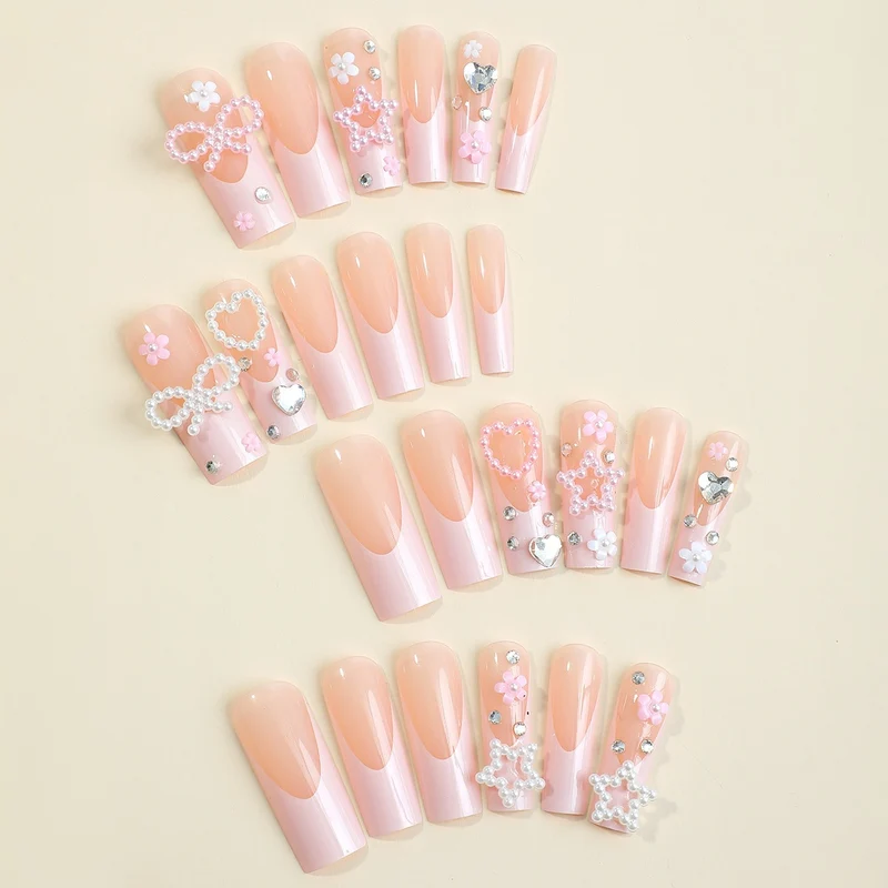 Glamouröses Kunstnagelset mit 3D-Schleifen und Glitzersteinen Brehn