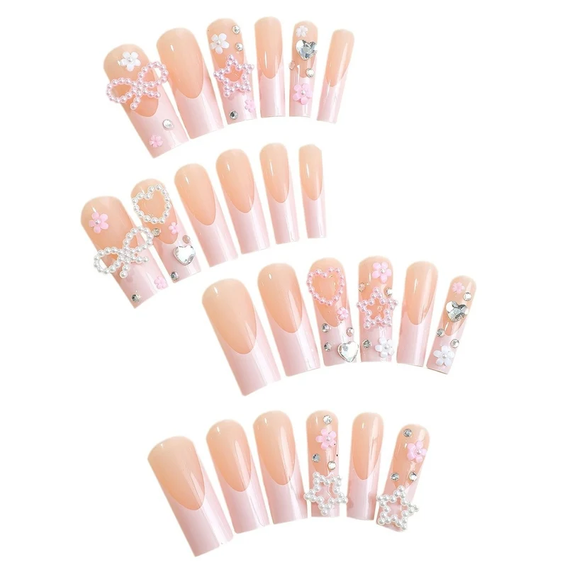 Glamouröses Kunstnagelset mit 3D-Schleifen und Glitzersteinen Brehn