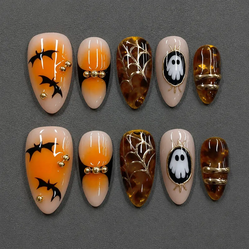 Halloween Kunstnagelset mit gespenstischen Motiven und goldenen Akzenten Brehn
